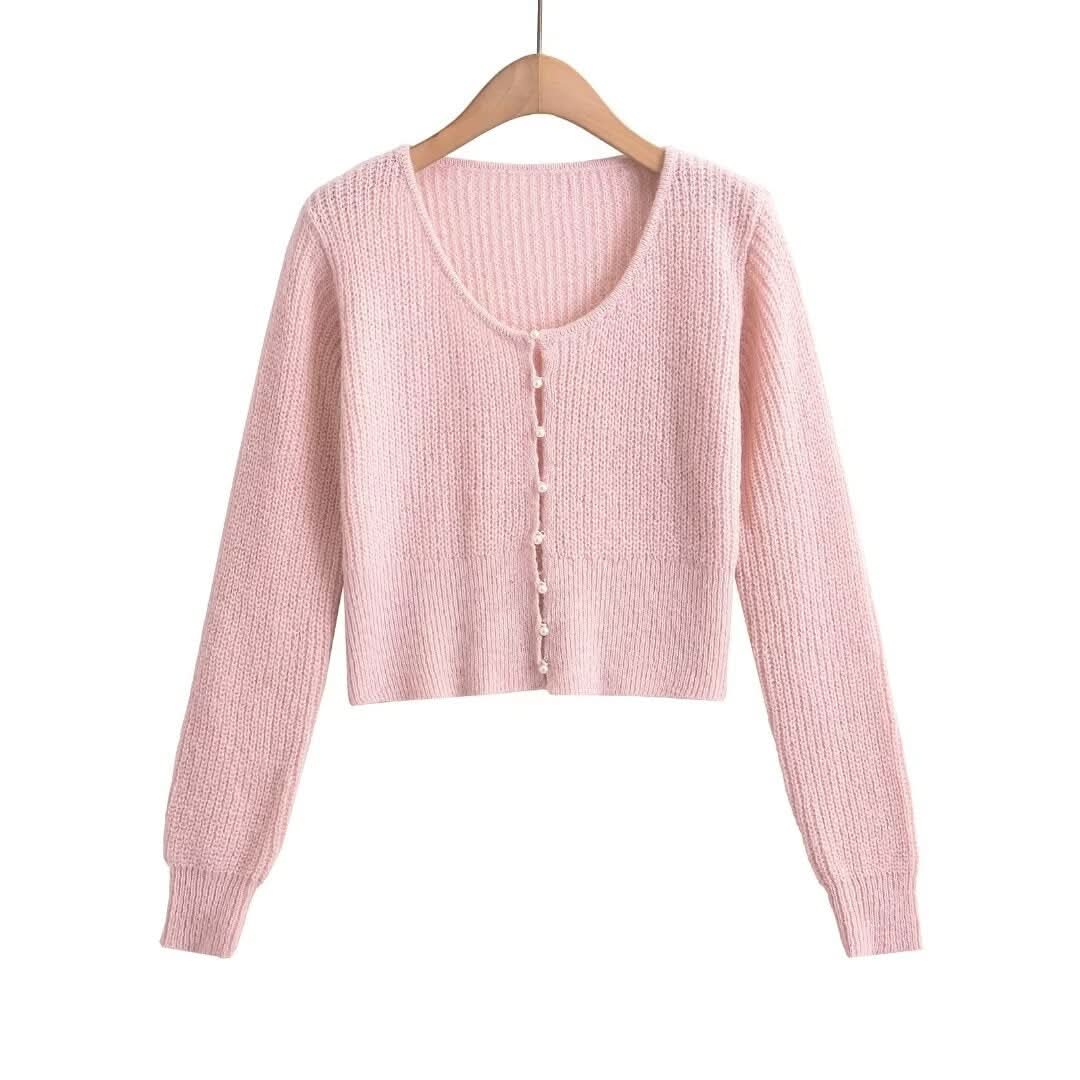 Solid color long sleeved round neck sweater