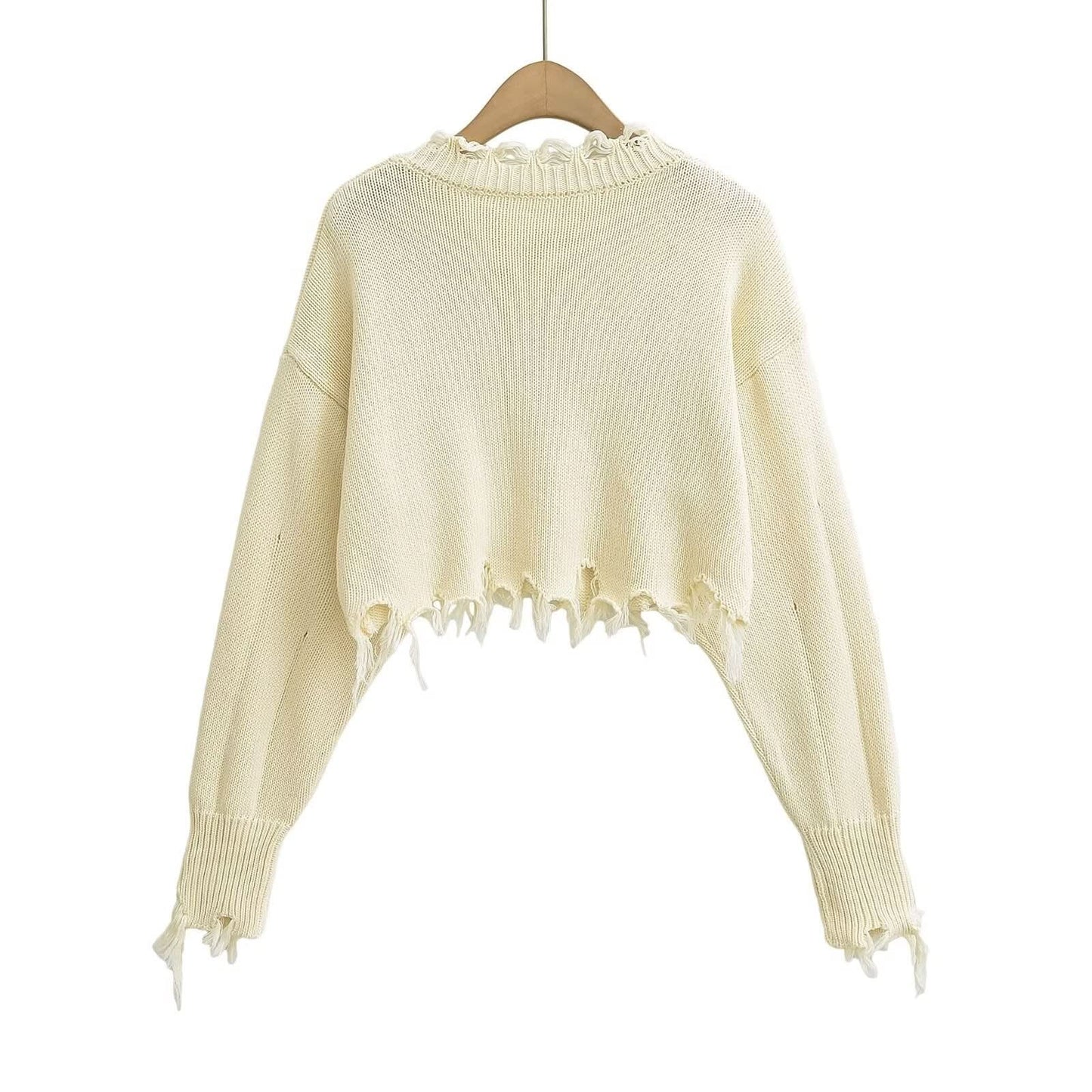 Kurzer bauchfreier Pullover mit Quasten und Cut-Outs