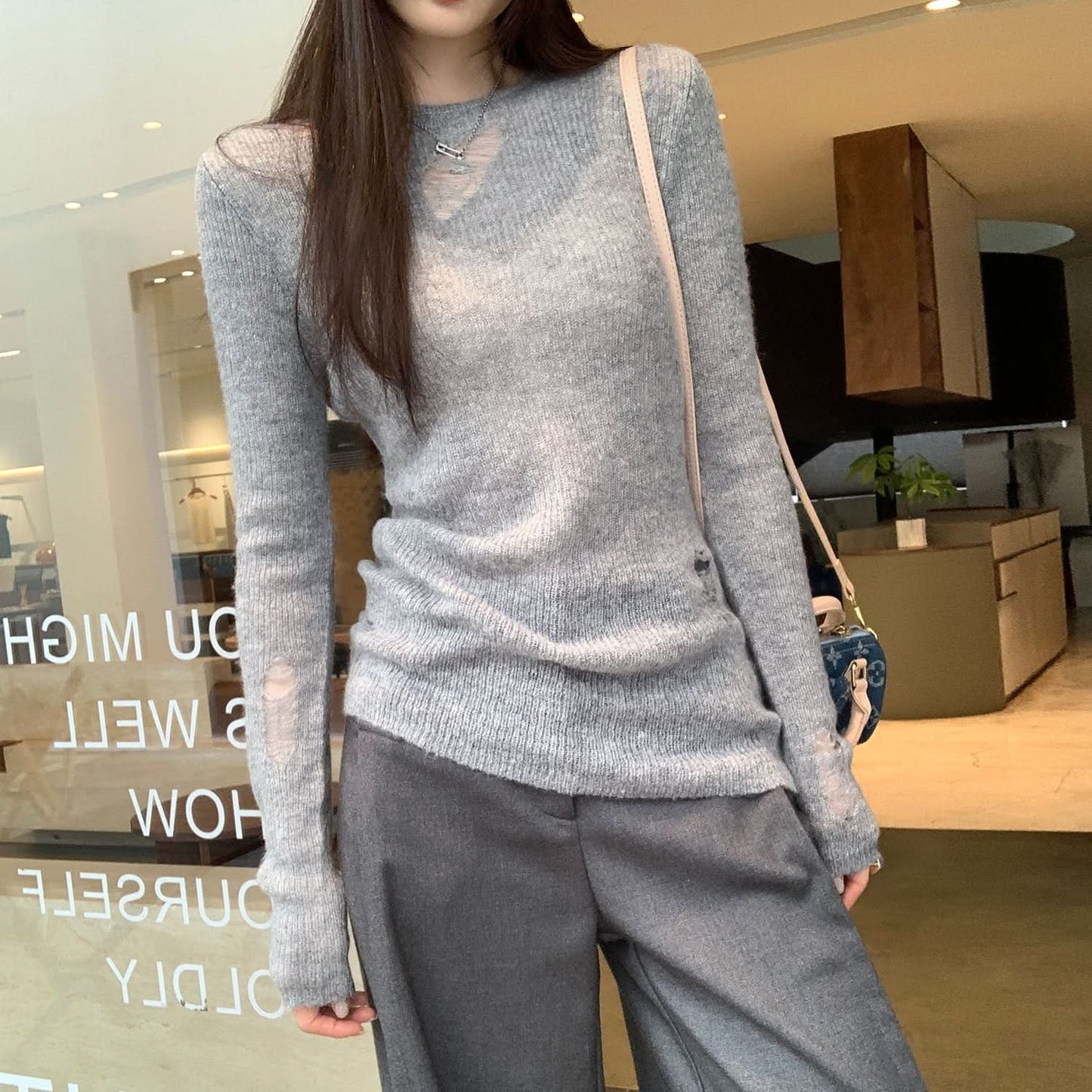 Design Sense unregelmäßiger Loch-Cut-Out sexy Langarm-Stricktop für Damen