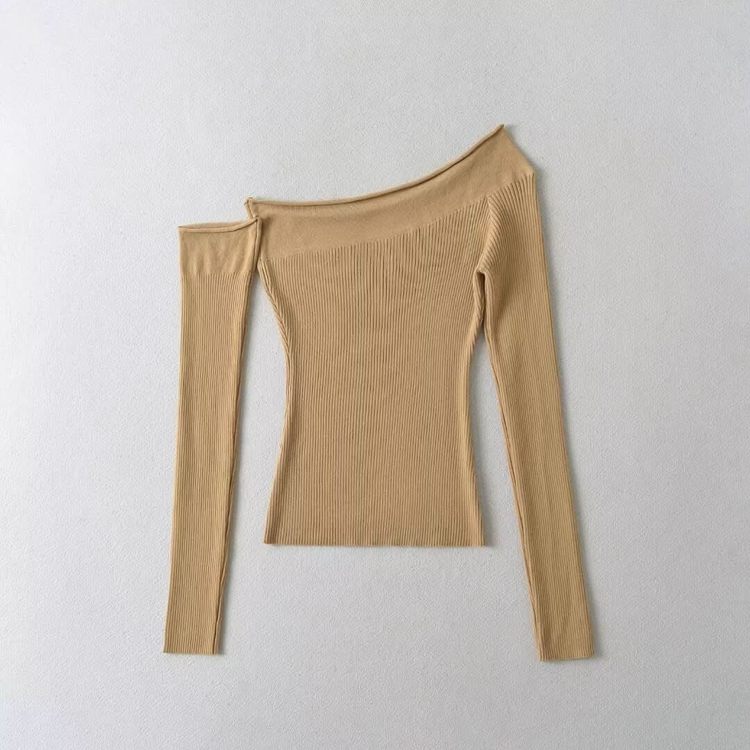 Solid color off shoulder top with sloping shoulders